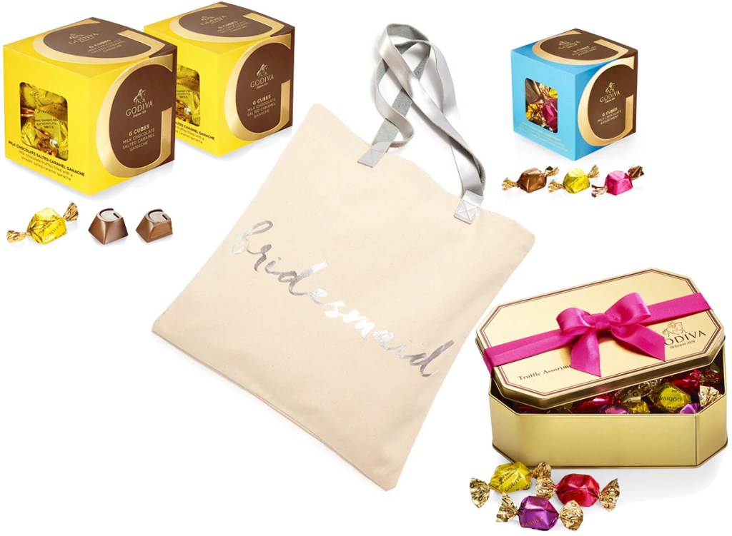 canvas tote bag that says bridesmaid in silver and boxes of assorted godiva chocolates