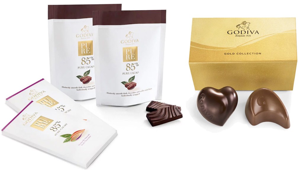 two Godiva chocolate bars and bags of ground coffee with a gold box of two truffles