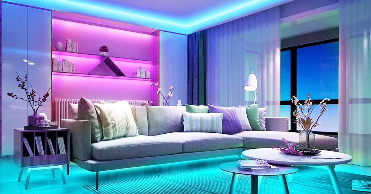 living room with led light strips on ceiling, bookcase, and under couch in different colors