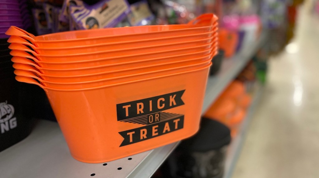 orange bucket that says Trick or Treat