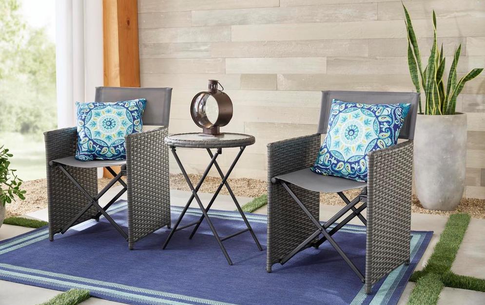 two chairs and table on a patio
