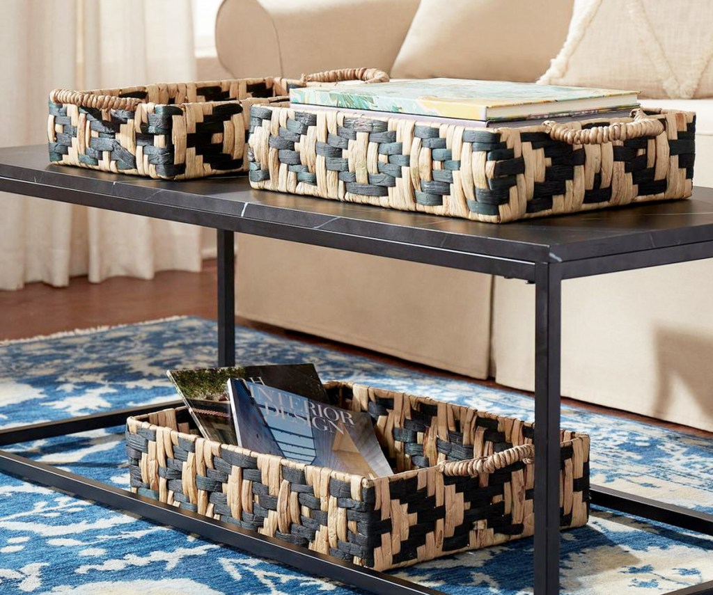 three black and brown patterned basket trays on coffee table