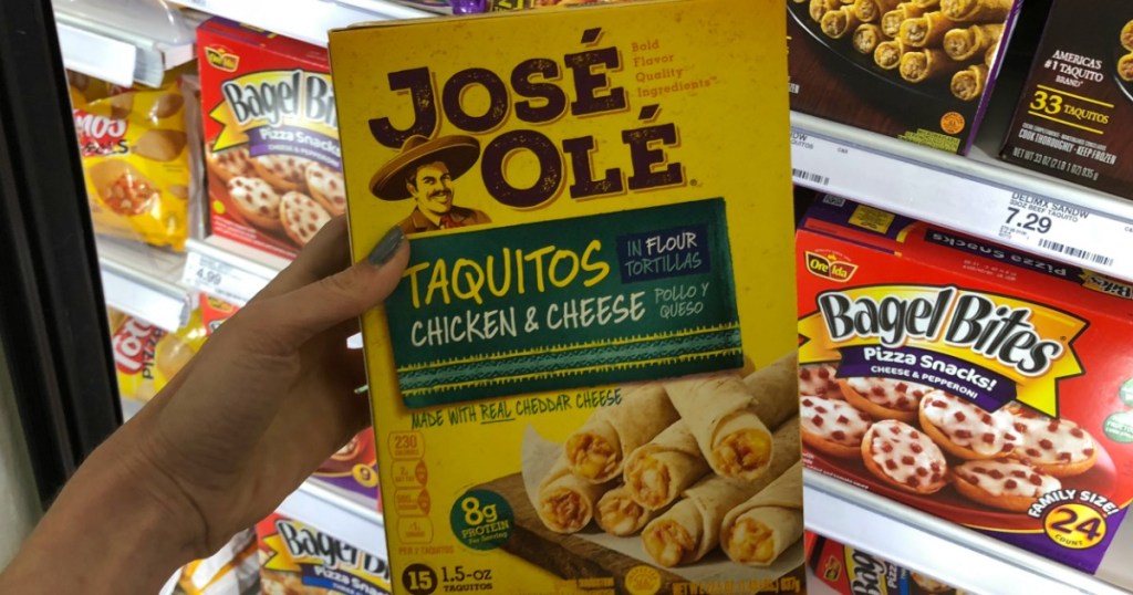 hand holding a box of Jose Ole Taquitos