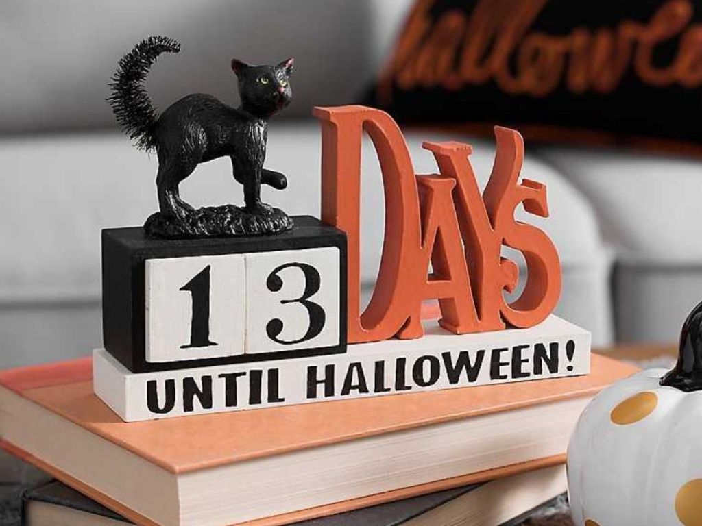 halloween countdown calendar with black cat on it