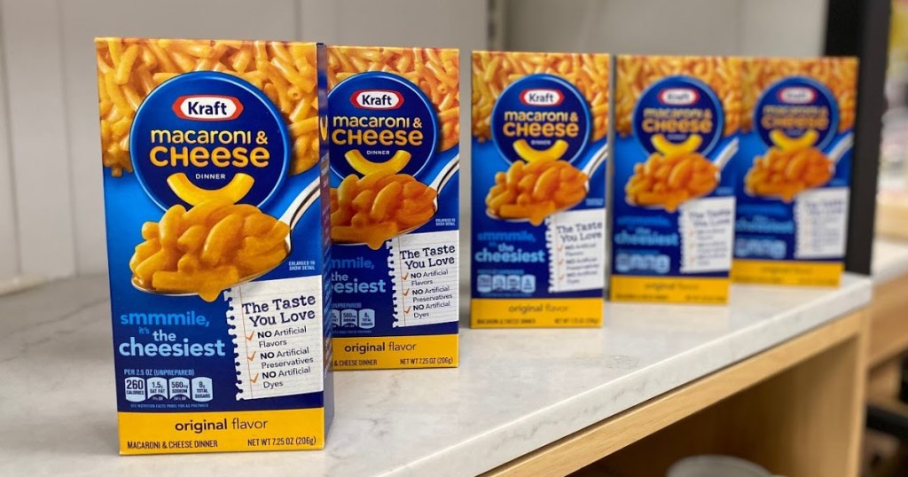 five boxes of mac n cheese lines up on counter