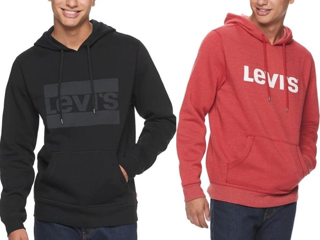 two men wearing hoodies