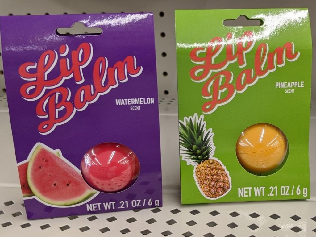 two dollar tree lip balms in packaging on store shelf 