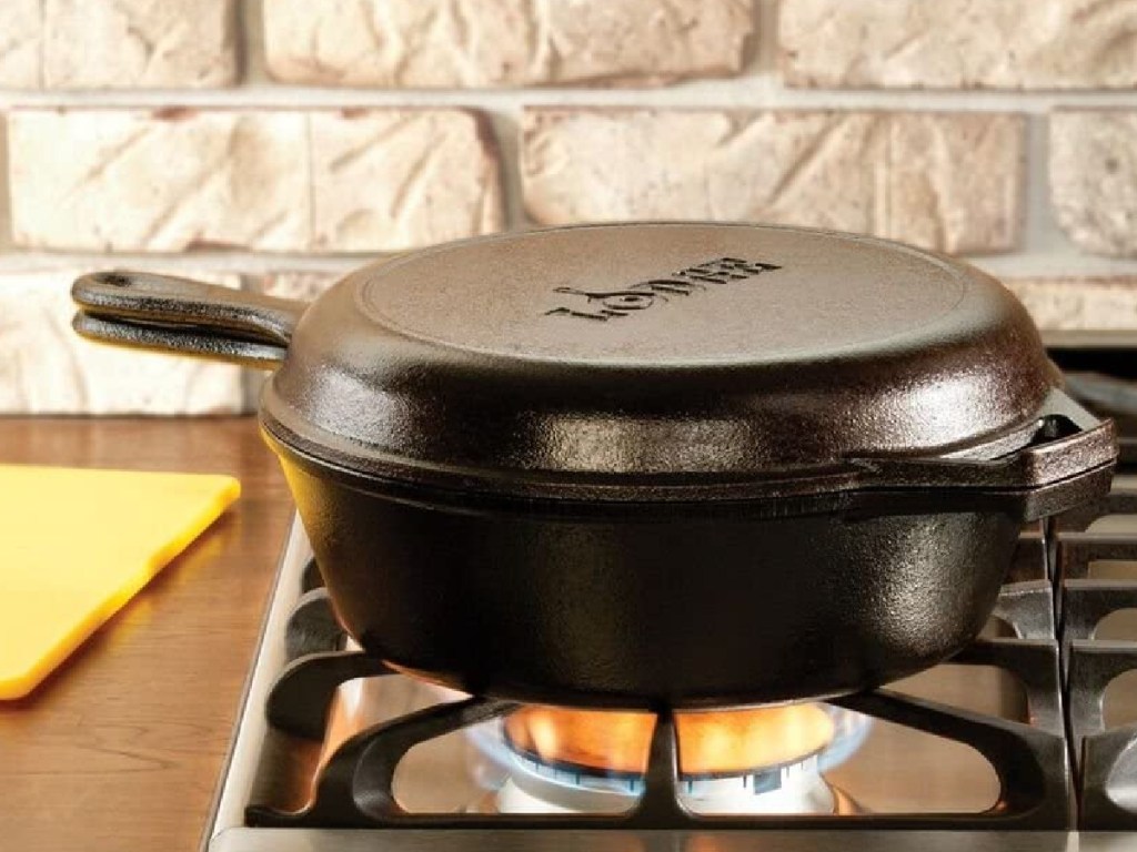 two-piece cast iron cookware on stove