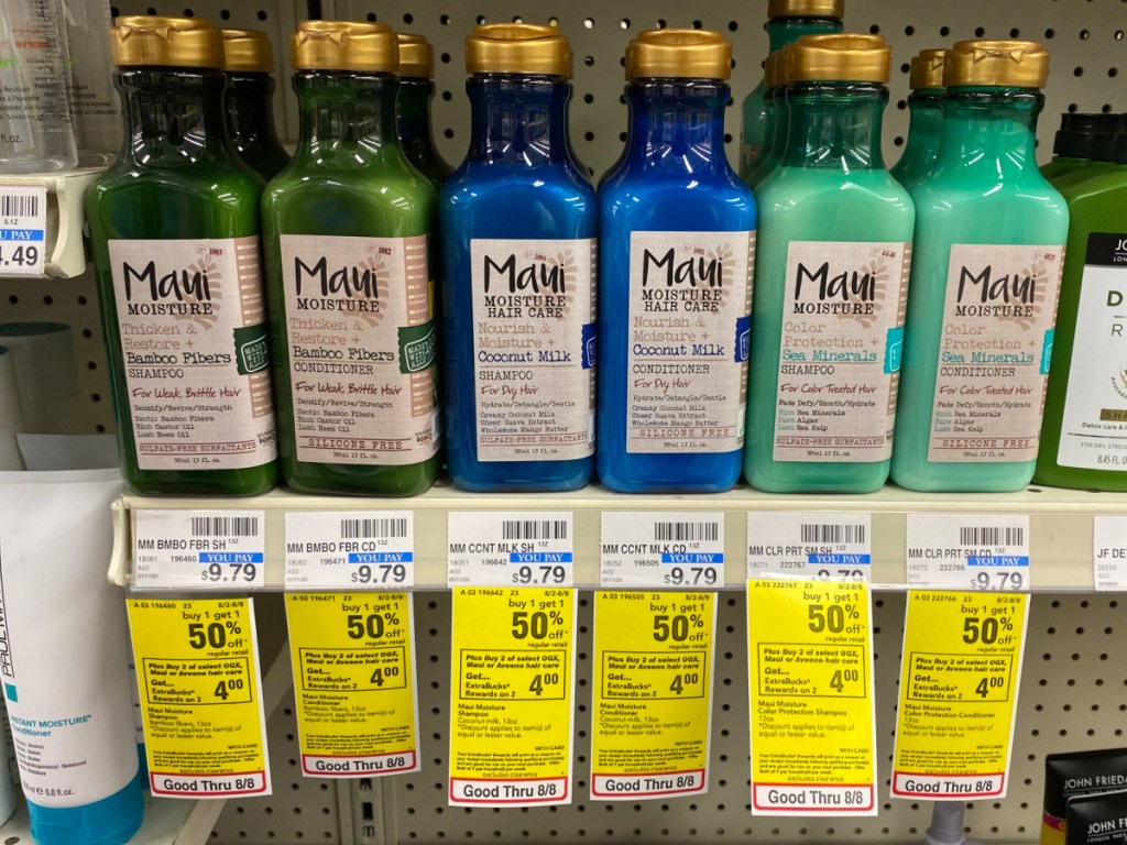CVS shelf with multiple maui hair care products and sale tags