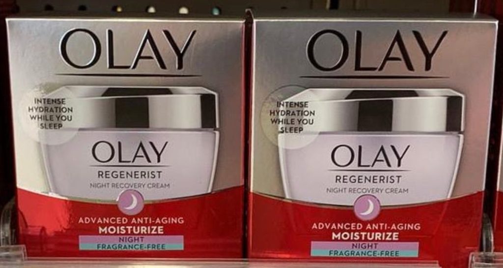 two boxes of olay night cream on sgtore shelf