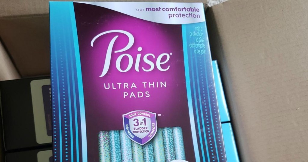 Poise pads in cardboard box