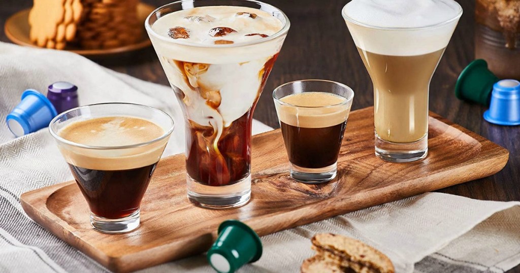 A variety of coffee drinks on a board