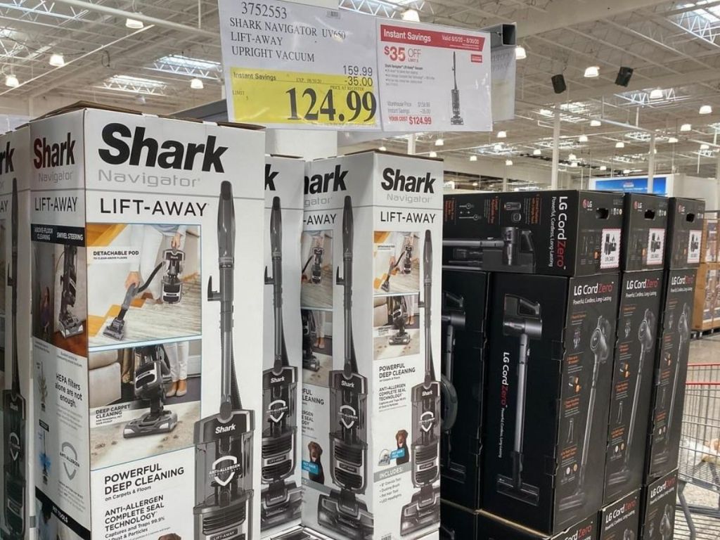 display of vacuums in boxes at store