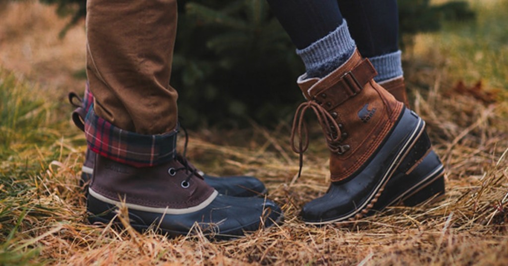Man and woman wearing sorel boots