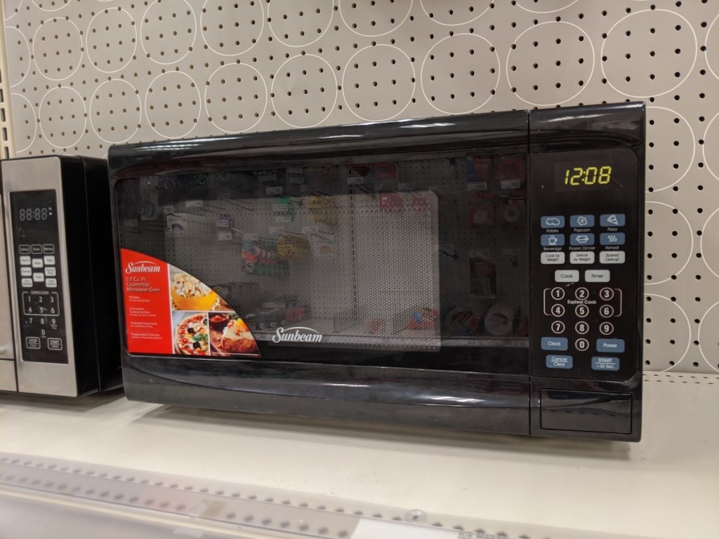 target shelf with Sunbeam 0.7 Cubic Feet 700-Watt Microwave