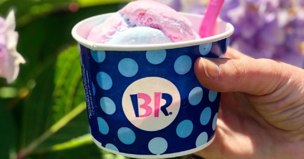 hand holding baskin robin ice cream cup with cotton candy flavor