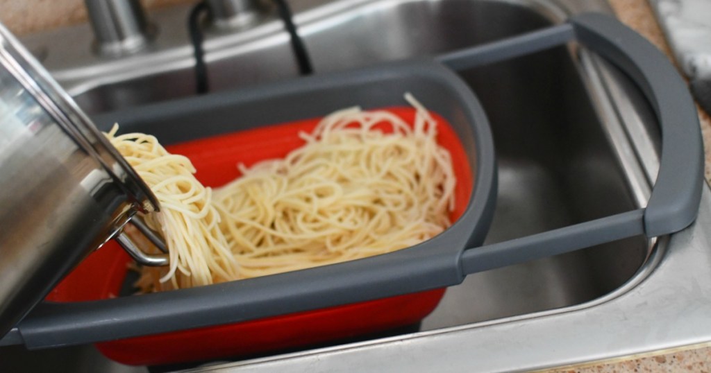 collapsible colander with spaghetti inside