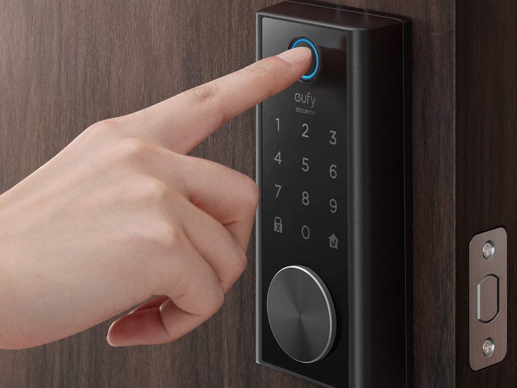 finger unlocking the eufy Smart Lock with Fingerprint Scanner
