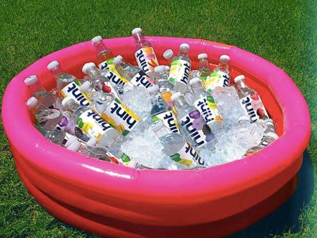 blow up pool full of water bottles on ice