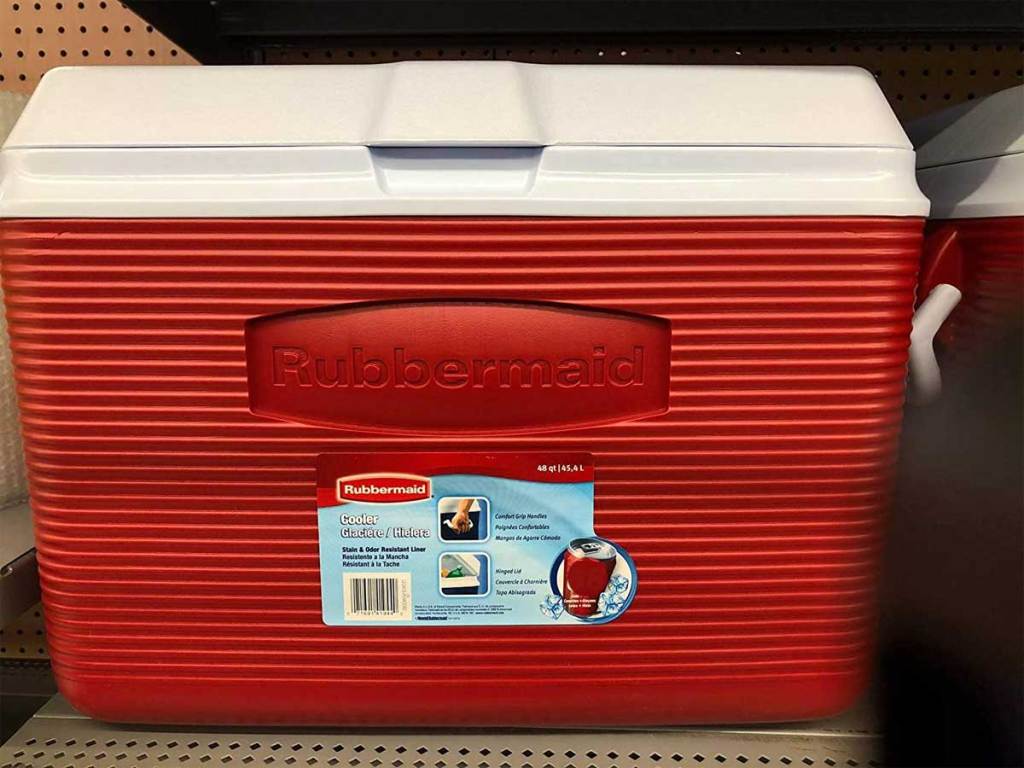 large red cooler on a shelf in a store
