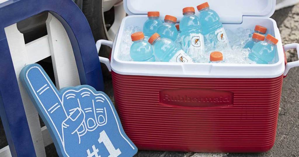 large red cooler with energy drinks over ice 