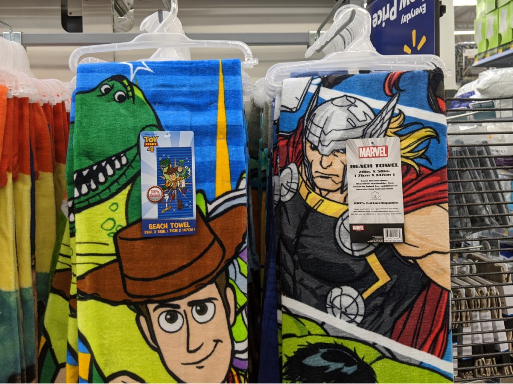 towels hanging in store with kids characters on them