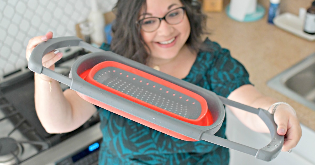 woman holding collapsible colander from amazon