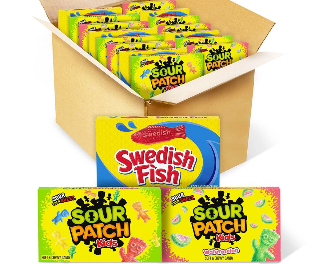 shipping box full of individual boxes of sour patch kids and swedish fish candies