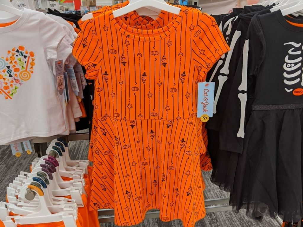 Little Girls Cat & Jack Pumpkin Print Dress on hanger at store