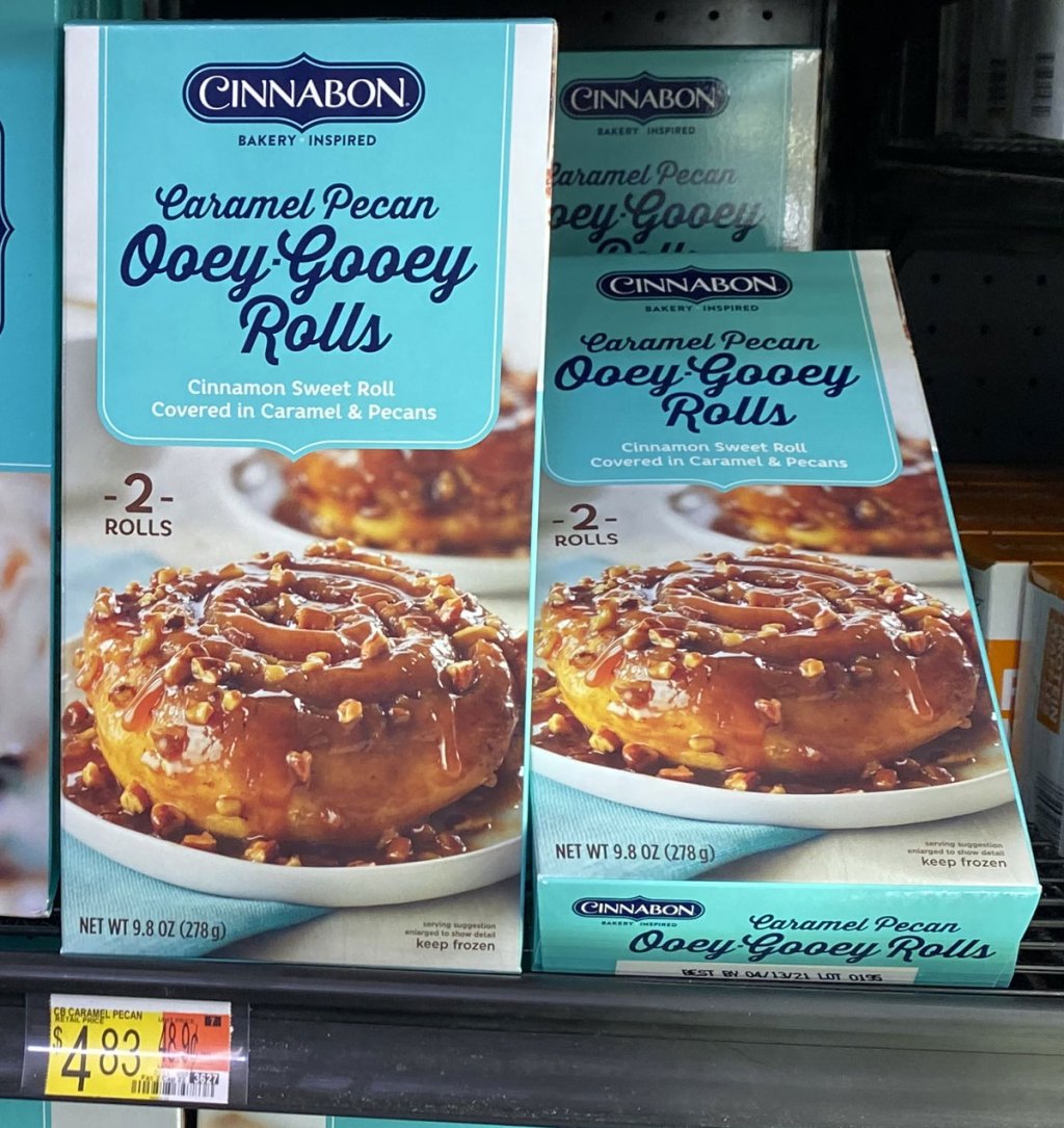 blue boxes of Cinnabon ooey-gooey breakfast rolls on walmart freezer shelf