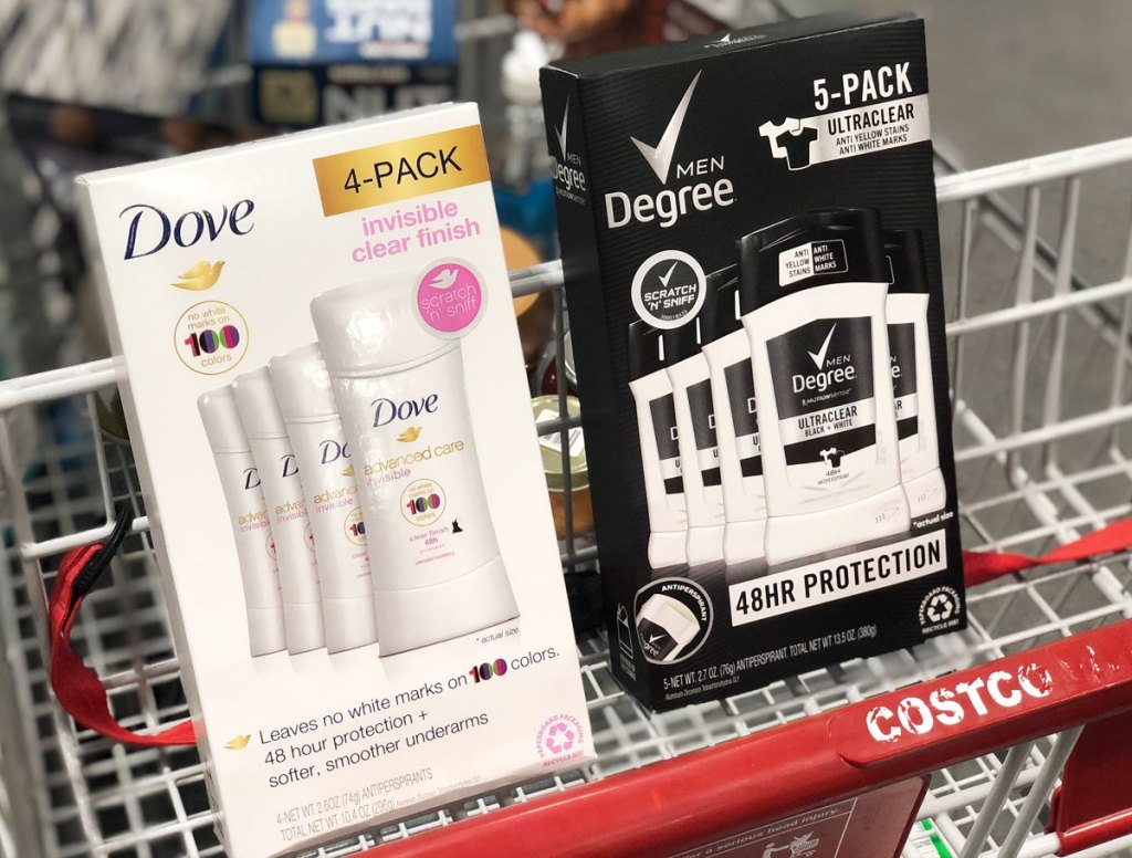 white 4-pack of dove deodorant and black 5-pack of degree men deodorant in child seat portion of costco shopping cart