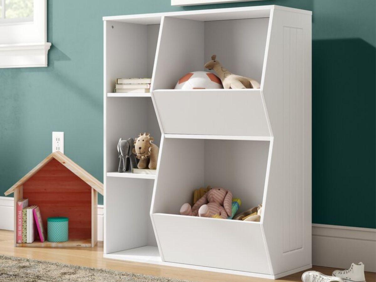 white storage shelf with kids items