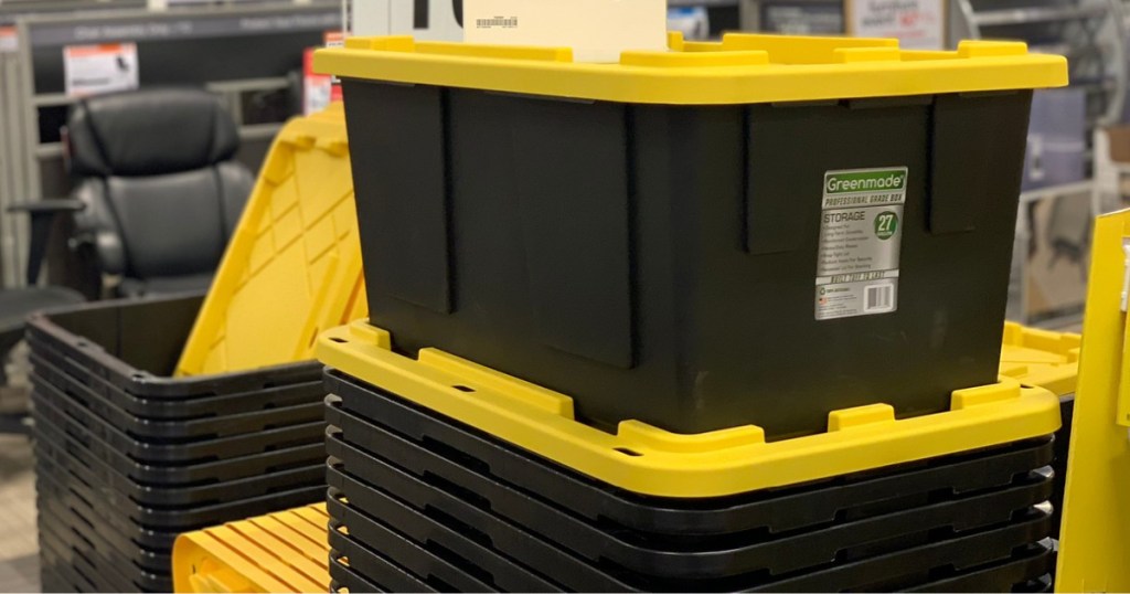 large black and yellow storage totes stacked in store