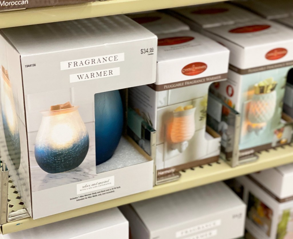 fragrance and wax warmers on shelf at Hobby Lobby