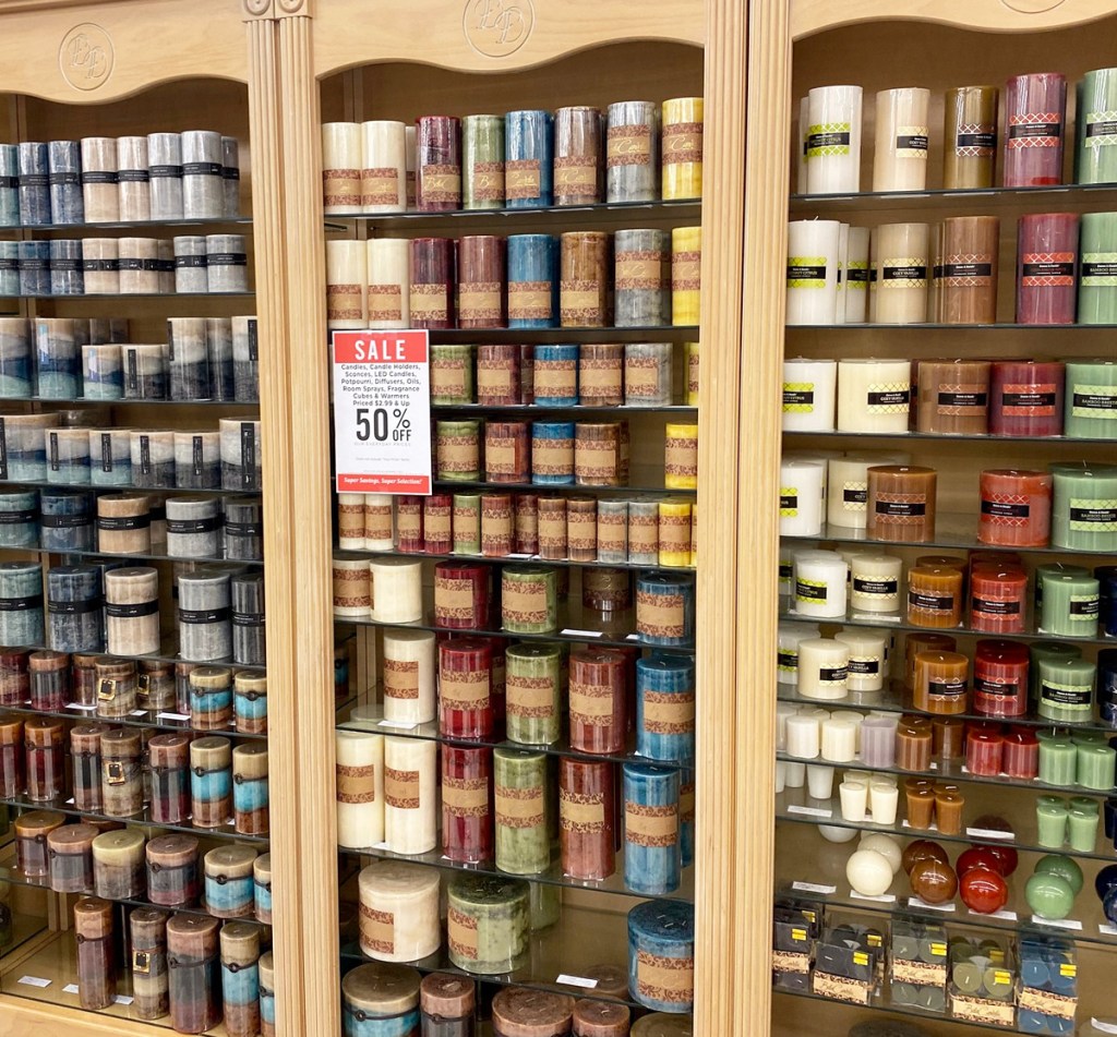 display cases full of pillar candles in various colors at Hobby Lobby
