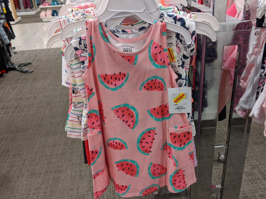 toddler girls pink watermelon print dress hanging in store