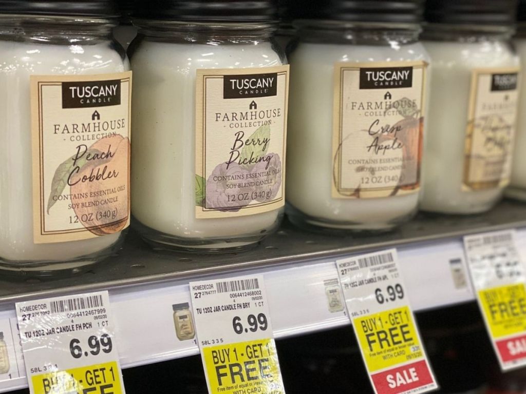 Shelf of farmhouse candles at Kroger