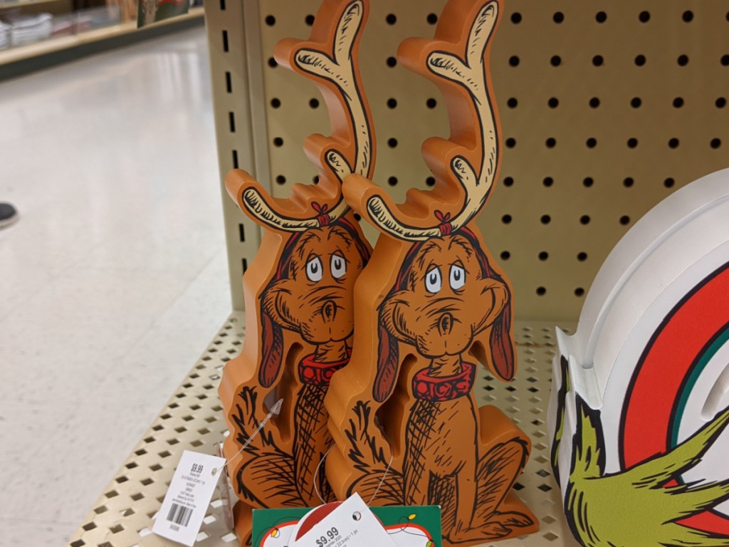 The Grinch's Max wood decor on store shelf