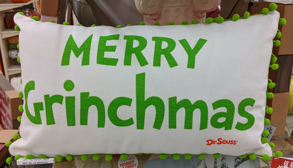 white and green Merry Grinchmas pillow