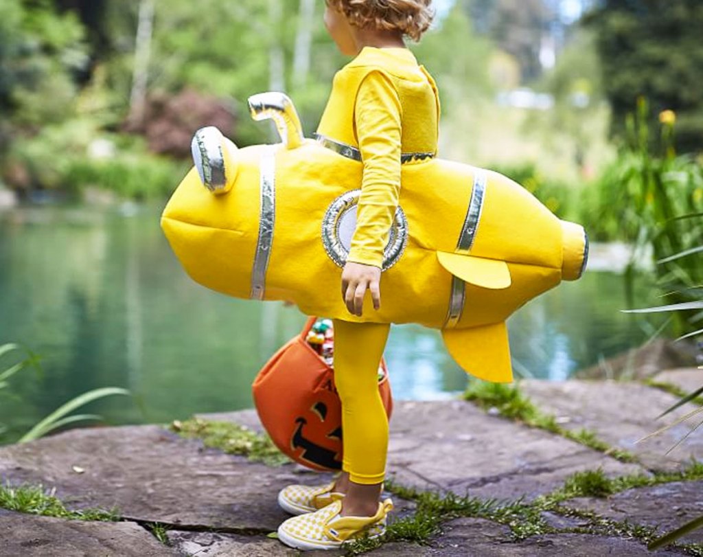 child dressed in yellow submarine halloween costume