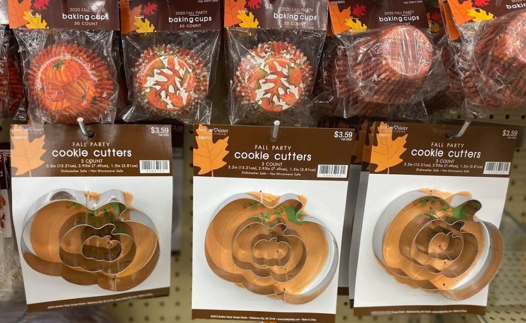 pumpkin shaped cookie cutters hanging in store