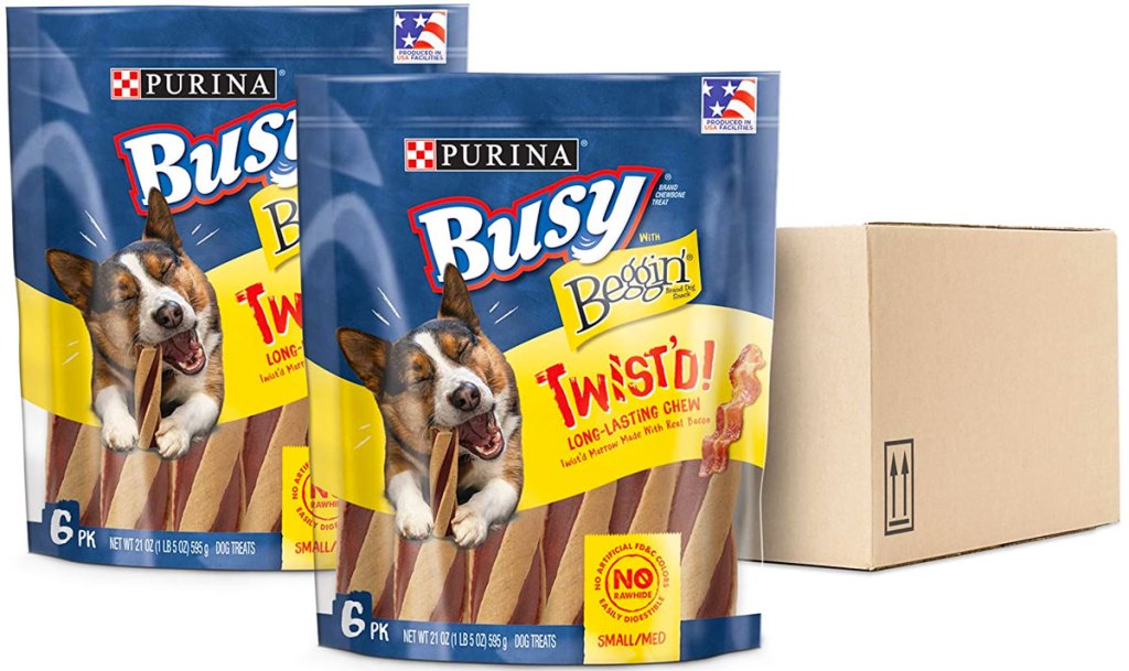 two bags of Purina busy with beggin dog treats next to brown shipping box