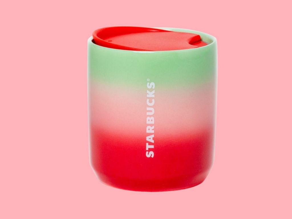 green pink and red cup with Starbucks lettering on side