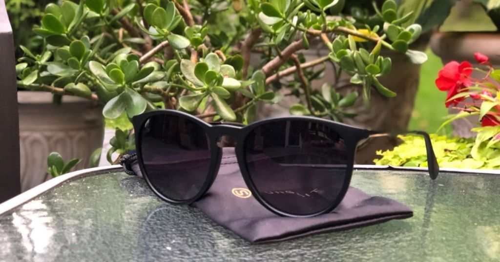 black sunglasses on patio table