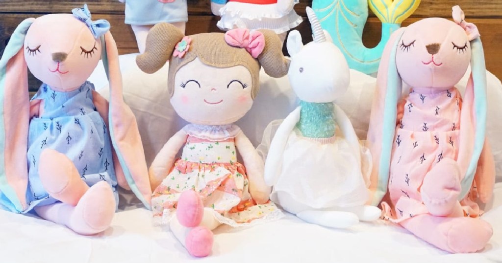 sweet dream stuffed dolls sitting next to each other