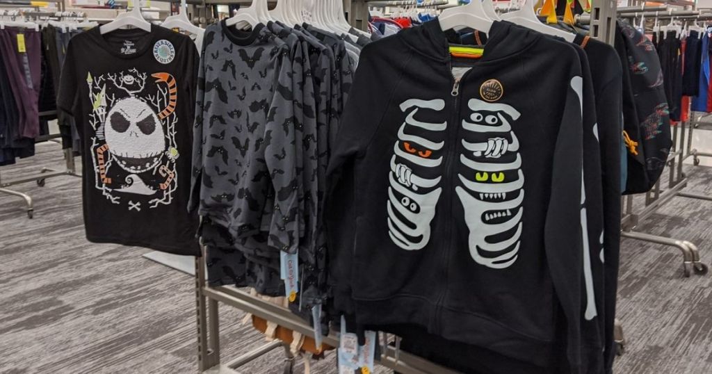rack of halloween themed clothing for kids