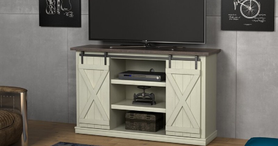 off white farmhouse-style tv stand in home