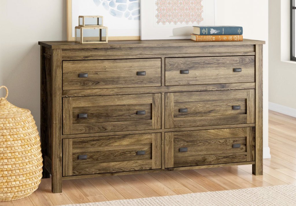 wooden six drawer dresser in bedroom