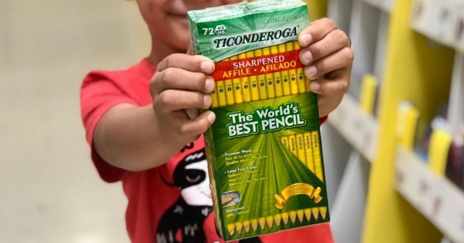 Little Boy Holding Ticonderoga pre-sharpened pencils