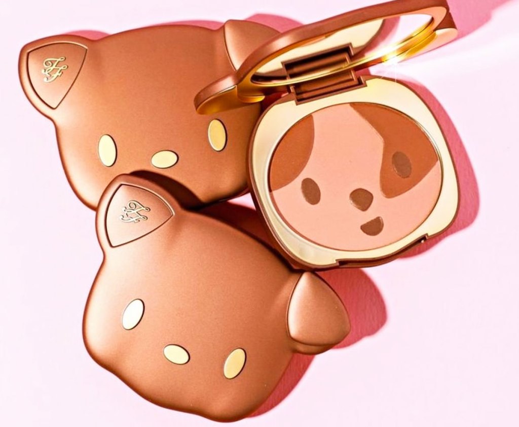 three puppy shaped bronzers on top of each other
